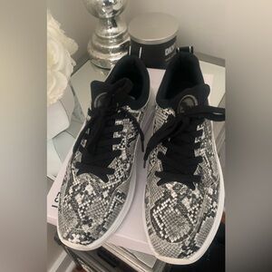 Women’s Nine West snake print sneaker